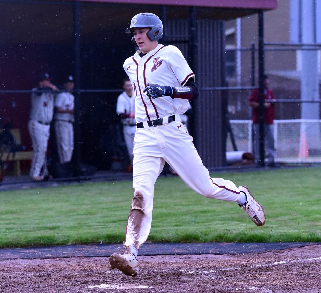 Elmira's Ashtyn Traugott-Knoll scores the first run at the team's new stadium as the Express beat Ithaca, 4-0, on April 17, 2024 behind a no-hitter from Bryce Mashanic.