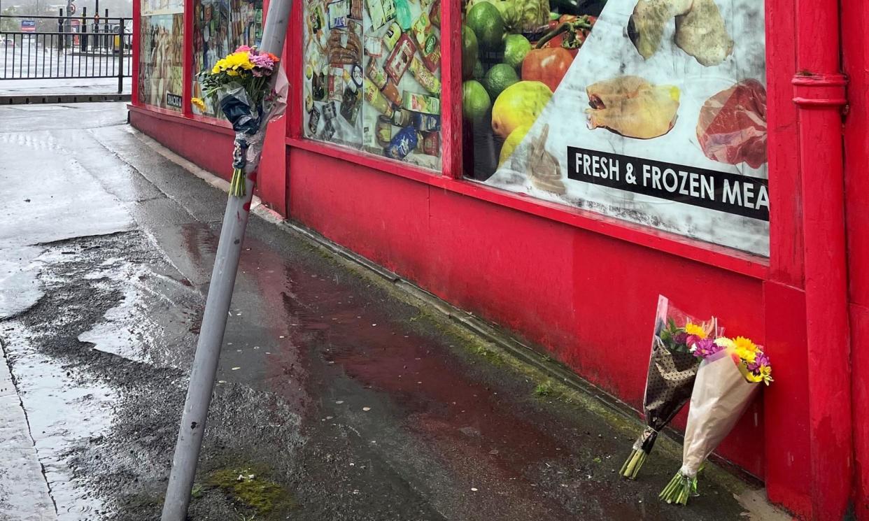 <span>Floral tributes left at the scene of the fatal attack in Bradford city centre.</span><span>Photograph: Dave Higgens/PA</span>