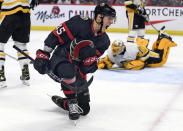 Ottawa Senators' Parker Kelly (45) celebrates his goal against Pittsburgh Penguins goaltender Casey DeSmith (1) during the second period of an NHL hockey game in Ottawa, on Saturday, Nov. 13, 2021. (Justin Tang/The Canadian Press via AP)