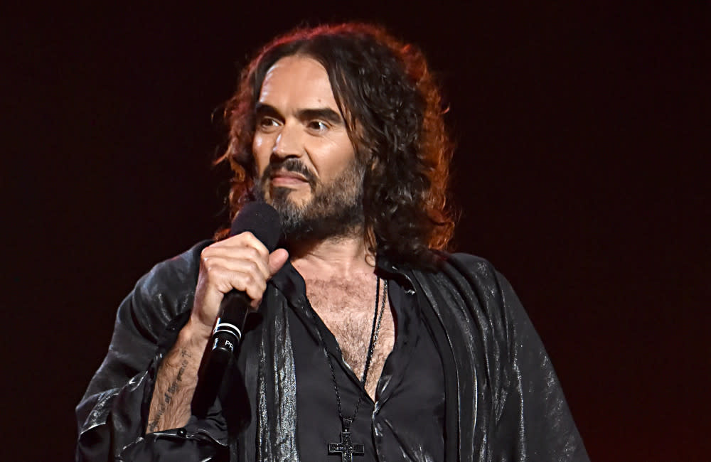 Russell Brand allegedly raped a woman against a wall at his LA mansion after bounding out of a room naked credit:Bang Showbiz