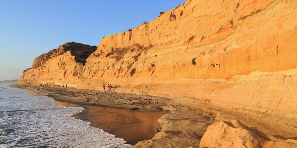 <p><span><strong>Best for Cliff Views </strong></span></p><p>Sandstone cliffs more than 300-feet high provide a dramatic backdrop as you take a dip in the Pacific Ocean or a walk along the golden-colored sand while in <a href="https://go.redirectingat.com?id=74968X1596630&url=https%3A%2F%2Fwww.tripadvisor.com%2FAttraction_Review-g60750-d531826-Reviews-Torrey_Pines_State_Beach-San_Diego_California.html&sref=https%3A%2F%2Fwww.redbookmag.com%2Flife%2Fg37132327%2Ftop-california-beach-vacations%2F" rel="nofollow noopener" target="_blank" data-ylk="slk:Torrey Pines State Beach;elm:context_link;itc:0;sec:content-canvas" class="link ">Torrey Pines State Beach</a>, located north of La Jolla. There's also great birding along the shoreline — keep an eye out for osprey, brown pelicans, and royal terns. </p><p><strong><em>Where to Stay: </em></strong><a href="https://go.redirectingat.com?id=74968X1596630&url=https%3A%2F%2Fwww.tripadvisor.com%2FHotel_Review-g32578-d77427-Reviews-San_Diego_Marriott_La_Jolla-La_Jolla_San_Diego_California.html&sref=https%3A%2F%2Fwww.redbookmag.com%2Flife%2Fg37132327%2Ftop-california-beach-vacations%2F" rel="nofollow noopener" target="_blank" data-ylk="slk:San Diego Marriott La Jolla;elm:context_link;itc:0;sec:content-canvas" class="link ">San Diego Marriott La Jolla</a>, <a href="https://go.redirectingat.com?id=74968X1596630&url=https%3A%2F%2Fwww.tripadvisor.com%2FHotel_Review-g32578-d77401-Reviews-Inn_by_the_Sea-La_Jolla_San_Diego_California.html&sref=https%3A%2F%2Fwww.redbookmag.com%2Flife%2Fg37132327%2Ftop-california-beach-vacations%2F" rel="nofollow noopener" target="_blank" data-ylk="slk:Inn by the Sea at La Jolla;elm:context_link;itc:0;sec:content-canvas" class="link ">Inn by the Sea at La Jolla</a></p>