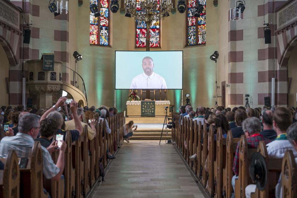 Visitors and attendees during the AI-created worship service in St. Paul Church, Bavaria, Germany. <a href="https://www.gettyimages.com/detail/news-photo/june-2023-bavaria-f%C3%BCrth-visitors-and-attendees-during-the-news-photo/1258555344?adppopup=true" rel="nofollow noopener" target="_blank" data-ylk="slk:Daniel Vogl/picture alliance via Getty Images;elm:context_link;itc:0;sec:content-canvas" class="link ">Daniel Vogl/picture alliance via Getty Images</a>