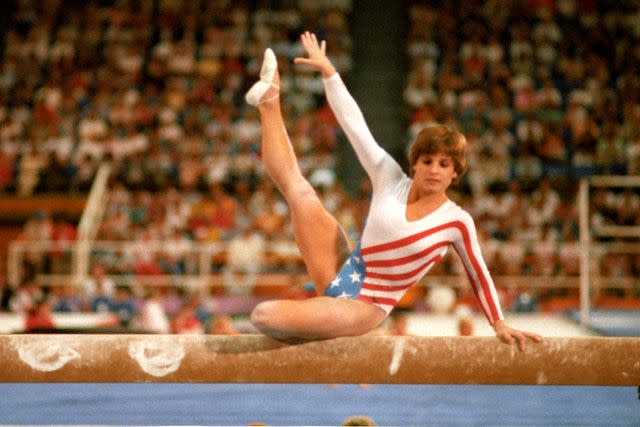 <p>Jerry Cooke /Sports Illustrated via Getty </p> Mary Lou Retton at the 1984 Summer Olympics.