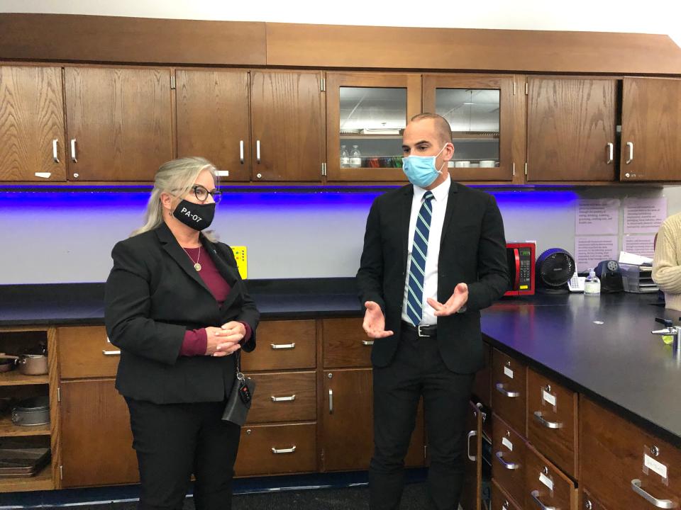 U.S. Rep. Susan Wild, left, and teacher leader Michael Healey talk in the kitchen area of East Stroudsburg High School South's new apartment-style classroom on Monday, Nov. 22, 2021.