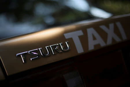 A Nissan Tsuru logo is seen on a taxi, in Mexico City, Mexico, October 26, 2016. REUTERS/Edgard Garrido