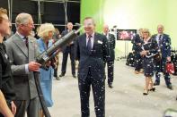 It's not <em>real</em> snow, but Prince Charles still had fun testing out a snow blower while visiting the set of <em>Doctor Who </em>in 2013.