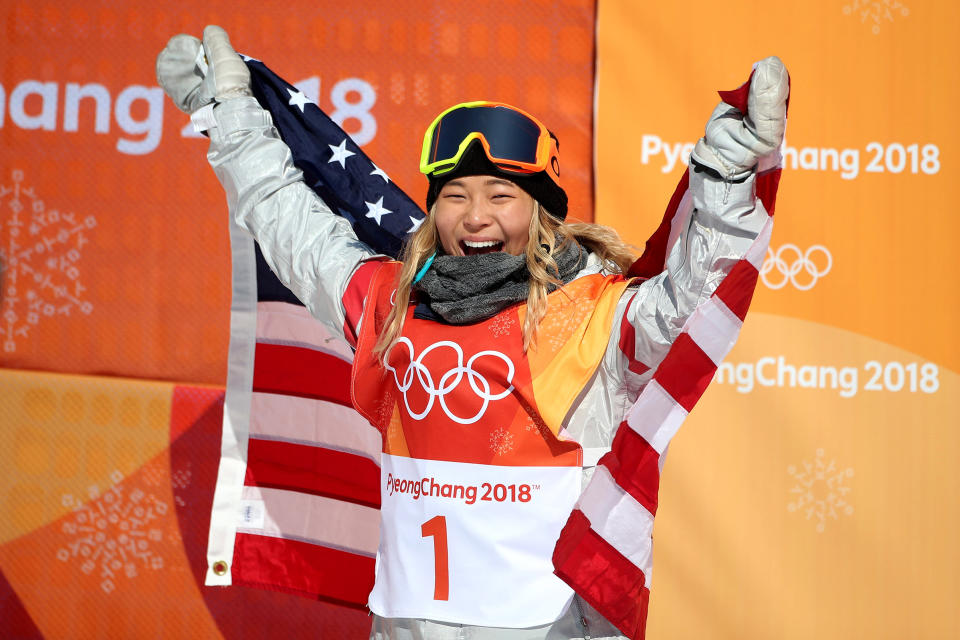 Gold medalist Chloe Kim of the United States celebrates her gold medal win during the Snowboard Ladies' Halfpipe competition on Feb. 13, 2018. | Tim Clayton—Corbis/Getty Images: