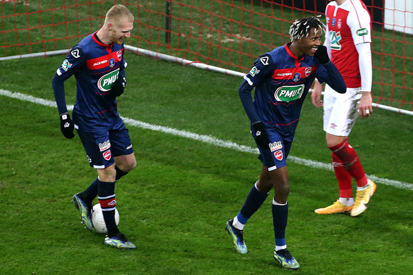 Valenciennes' French forward Kevin Cabral (R) celebrates after scoring during the French Cup round-of-64 football match.