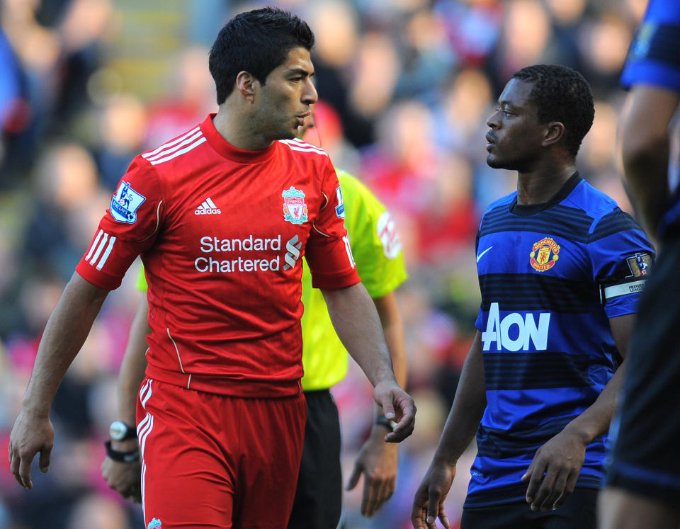 Luis Suarez and Patrice Evra's infamous row (ANDREW YATES/AFP/Getty Images)