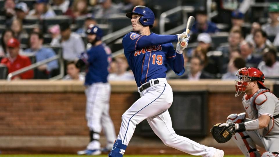 May 31, 2023;  New York City, New York, USA;  New York Mets left fielder Mark Canha (19) hits an RBI single against the Philadelphia Phillies during the fourth inning at Citi Field.