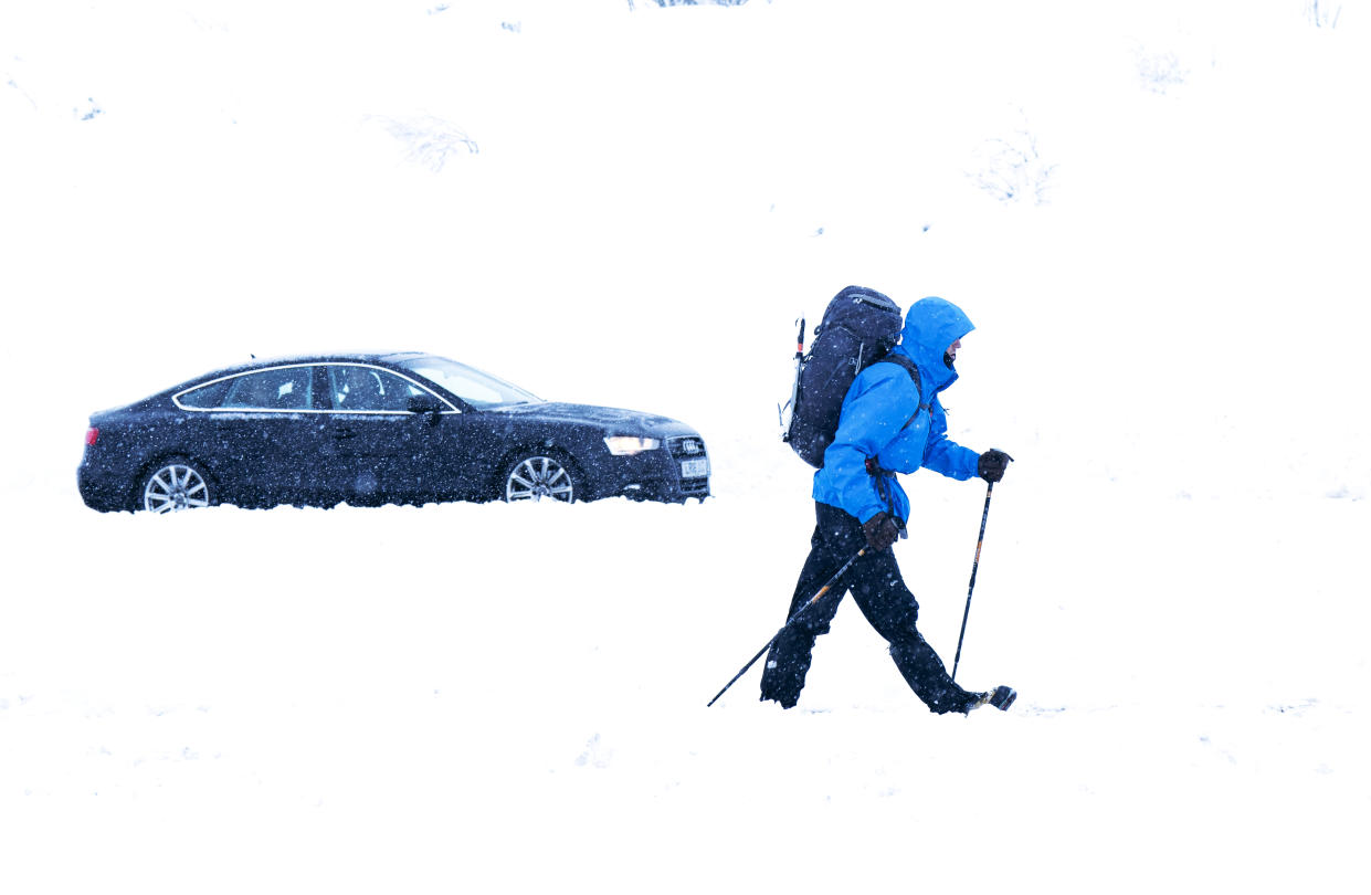 A walker makes their way through the snow in the Cairngorms National Park near Aviemore. Large areas of the country have been warned to expect severe conditions during the weekend, with snow forecast for Scotland and the south-east of England. Picture date: Saturday December 10, 2022.