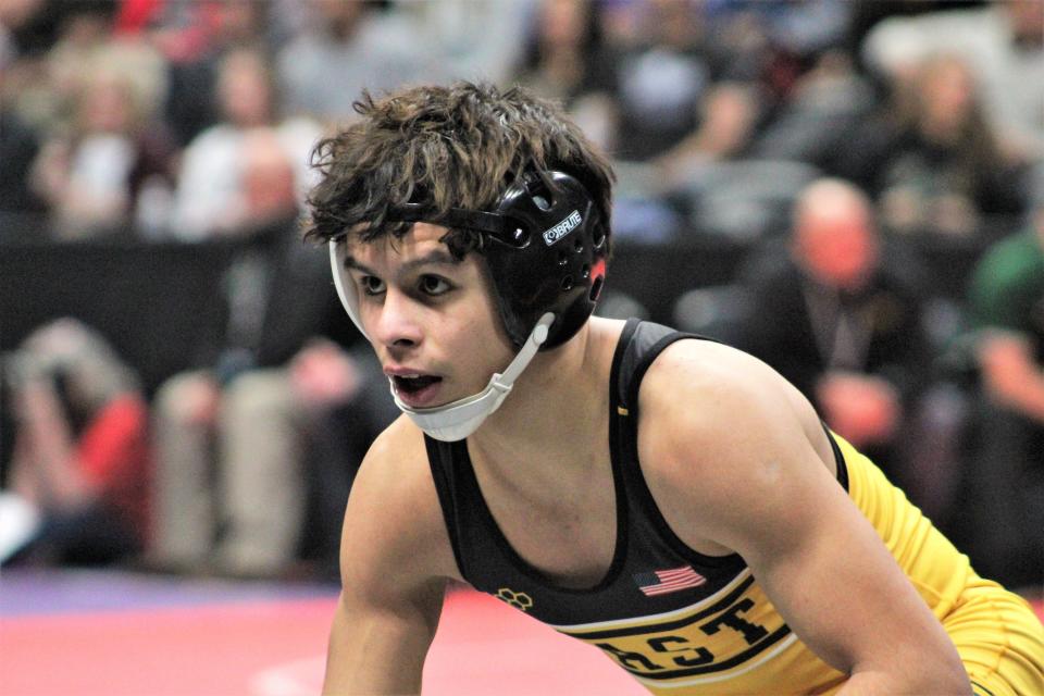 Manuel 'Pocky' Amaro sizes up his competition in the 106-pound semifinal matchup of the CHSAA Class 4A state wrestling tournament held at Ball Arena on Feb. 17, 2023.