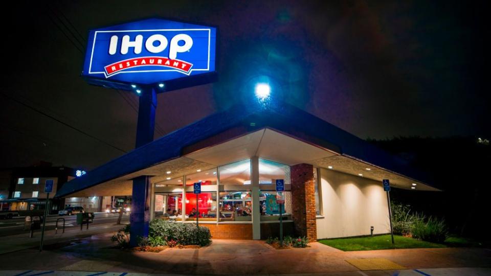 edward hopper style view of los angeles california ihop at night with neon sign on