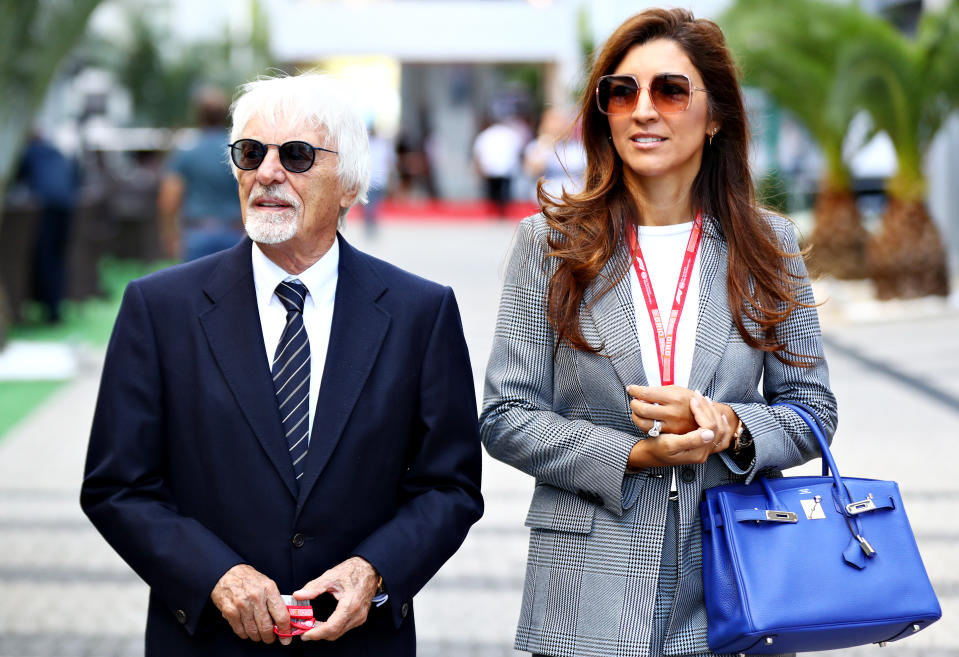 Bernie Ecclestone, Chairman Emeritus of the Formula One Group, and his wife Fabiana walk in the Paddock before the F1 Grand Prix of Russia at Sochi Autodrom on September 29, 2019 in Sochi, Russia. (Photo by Mark Thompson/Getty Images)