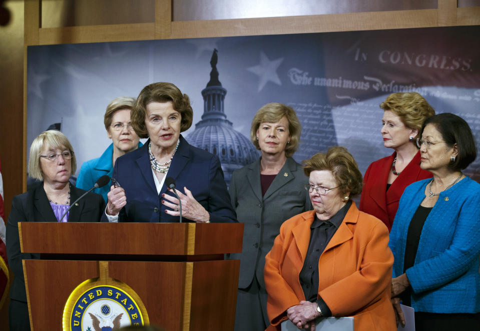 FILE - Sen. Dianne Feinstein, D-Calif., and a group of women senators gather at a news conference on Capitol Hill in Washington, Wednesday, June 4,2014, to advocate for a bill by Sen. Elizabeth Warren, D-Mass., the Bank on Students Emergency Loan Refinancing Act, that would allow people with outstanding student loan debt to refinance at the lower interest rates currently offered to new borrowers. From left are, Sen. Patty Murray, D-Wash., Sen. Elizabeth Warren, D-Mass., Feinstein, Sen. Tammy Baldwin, D-Wis., Sen. Barbara A. Mikulski, D-Md., Sen. Mazie K. Hirono, D-Hawaii. Democratic Sen. Dianne Feinstein of California has died. She was 90. (AP Photo/J. Scott Applewhite)