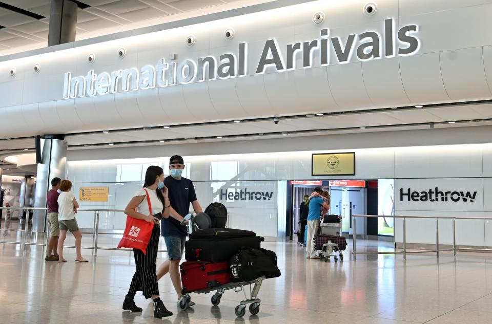 <p>All travellers coming into the UK will have to quarantine for at least five days</p> (AFP via Getty Images)