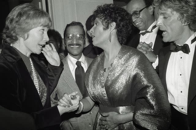 <p>Getty</p> Shirley MacLaine, Sammy Davis Jr. and Lena Horne in 1981