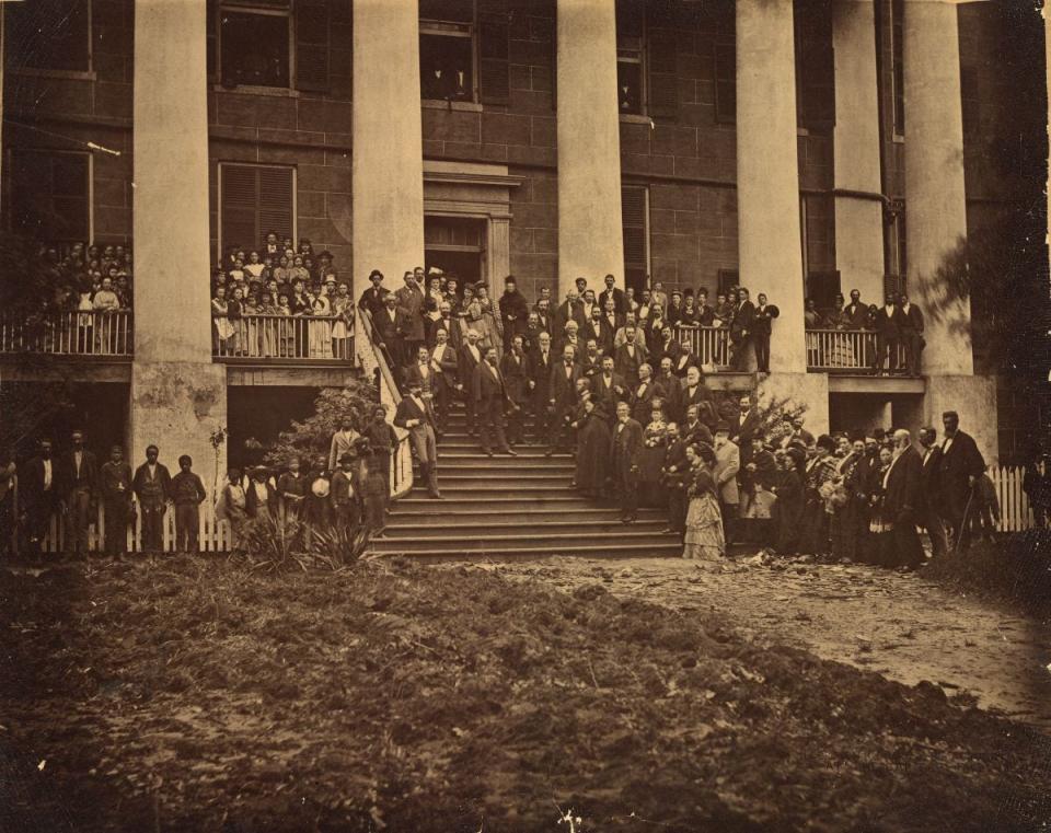 Harriet Beecher Stowe, 6th step right, lady in black, at the Florida Capital to promote public education. The famed activist was not popular among the Planter Class of the Big Bend and was accompanied by a group of armed men.