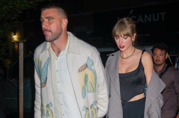 Travis Kelce and Taylor Swift are photographed leaving a 