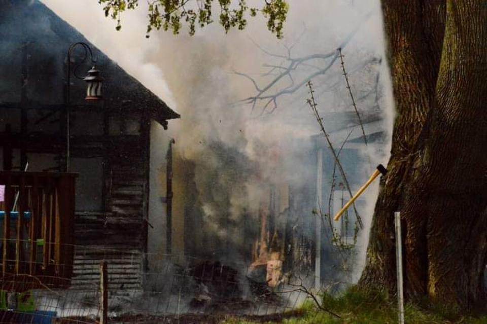 Firefighters battle a blaze in the 100 block of Argyle St. in Jackson Friday. (Courtesy Michigan Fire Alerts)