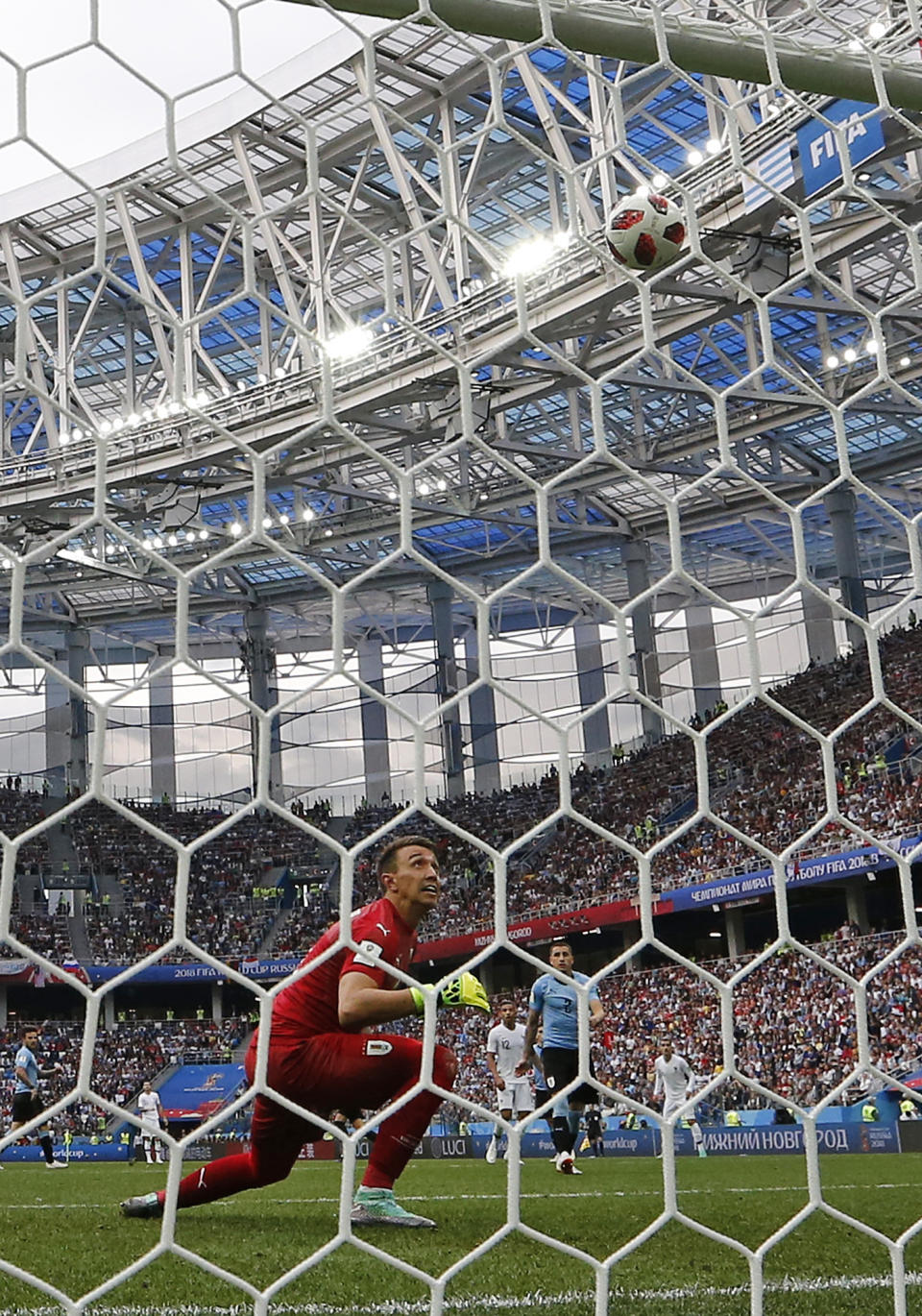 Uruguay goalkeeper Fernando Muslera is beaten by a shot from France’s Antoine Griezmann for his side’s second goal during the quarterfinal match between Uruguay and France at the 2018 soccer World Cup in the Nizhny Novgorod Stadium, in Nizhny Novgorod, Russia, Friday, July 6, 2018. (AP Photo/Natacha Pisarenko)