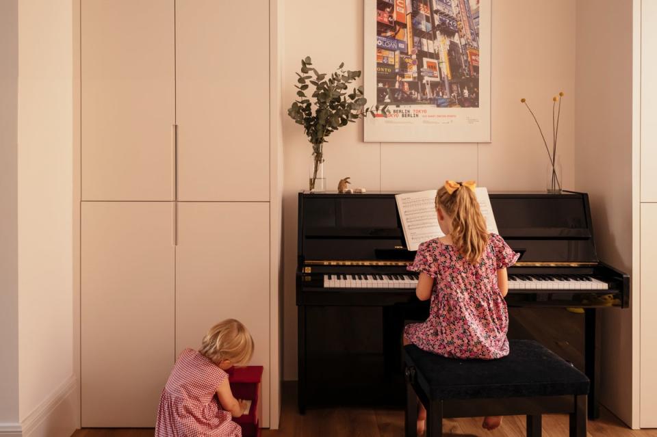 The playroom has plenty of well-planned storage as well as a vintage Japanese piano (Jim Stephenson 2022)