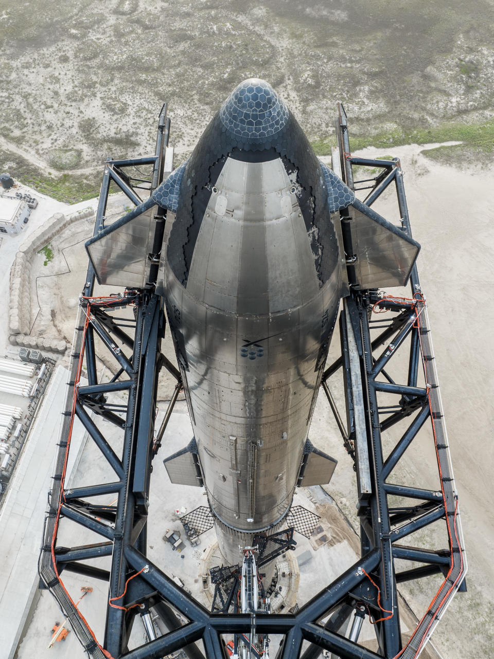 SpaceX's Starship vehicle sits fully stacked at the Starbase facility in South Texas on April 6, 2023, ahead of a planned orbital test flight attempt.