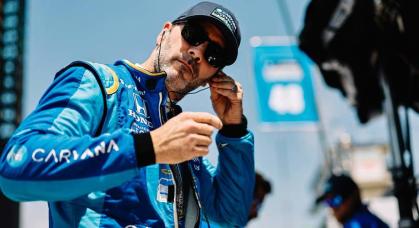 Jimmie Johnson preps on the grid before the 106th running of the Indianapolis 500