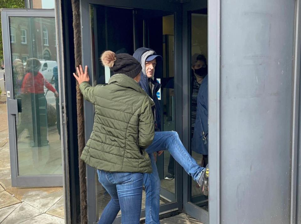 Worcester News: ANGER: Two protestors at one stage barricaded Holly LeGresley in the revolving doors at Worcester Magistrates Court