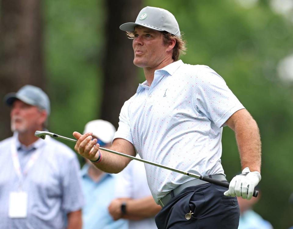 Former Carolina Panthers tight end Greg Olsen watches his drive from the sixth tee box during the Wells Fargo Championship Pro-Am at Quail Hollow Club on Wednesday, May 8, 2024.