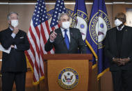 House Budget Committee Chairman John Yarmuth, D-Ky., center, is flanked by Ways and Means Committee Chairman Richard Neal, D-Mass., left, and Majority Whip James Clyburn, D-S.C., at a news conference ahead of the vote on the Democrat's $1.9 trillion COVID-19 relief bill, at the Capitol in Washington, Tuesday, March 9, 2021. (AP Photo/J. Scott Applewhite)