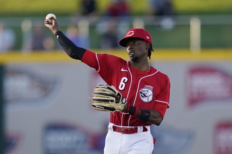 FILE - Cincinnati Reds second baseman Dee Strange-Gordon warms up prior to a spring training baseball game against the Texas Rangers in Goodyear, Ariz., in this Wednesday, March 24, 2021, file photo. The Milwaukee Brewers have signed two-time All-Star Dee Strange-Gordon to a minor league contract and have assigned him to their alternate training site in Appleton, Wisconsin. Strange-Gordon, who turns 33 on Thursday, April 22, had gone to spring training camp with the Cincinnati Reds as a non-roster invitee but was released on March 26. (AP Photo/Ross D. Franklin, File)