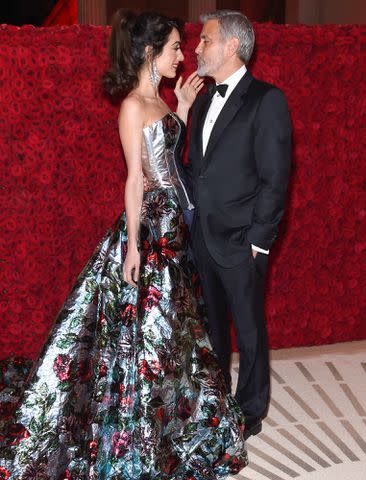 Kevin Mazur/Getty George and Amal Clooney at the Met Gala