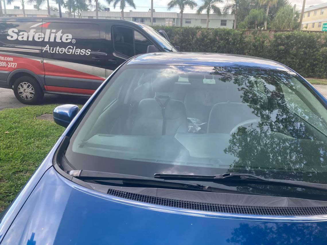 A windshield repair service visits a home in Broward County.