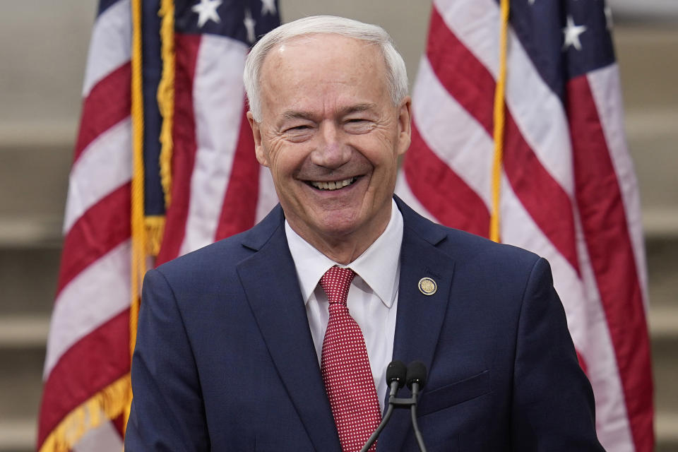 FILE - Former Arkansas Gov. Asa Hutchinson formally announces his Republican campaign for president, April 26, 2023, in Bentonville, Ark. In the coming weeks, at least four additional candidates are expected to launch their own presidential campaigns, joining a field that already includes Florida Gov. Ron DeSantis, Sen. Tim Scott, R-S.C., former U.N. Ambassador Nikki Haley, Hutchinson, tech billionaire Vivek Ramaswamy and several longer-shots like conservative talk radio host Larry Elder. (AP Photo/Sue Ogrocki, File)