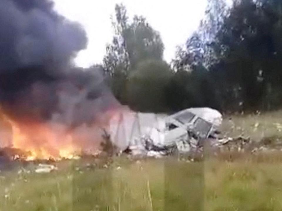 Eyewitness footage of the crash site of a plane linked to Wagner Chief Yevgeny Prigozhin, near Kuzhenkino, Tver region, Russia, in this screen grab taken from a video.
