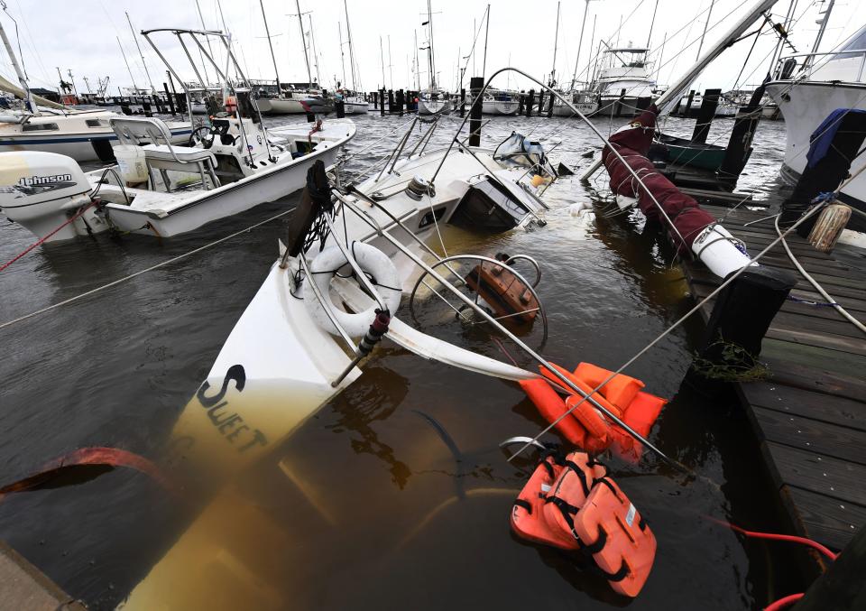 <p>A sunken boar at Rockport Harbor after heavy damage when Hurricane Harvey hit Rockport, Texas on Aug.26, 2017. (Photo: Mark Ralston/AFP/Getty Images) </p>