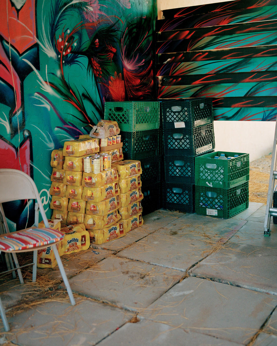 Gallons of water and cans of beans are stockpiled outside of the Ajo Humanitarian Aid Office, just south of the town's plaza. | Cassidy Araiza for TIME