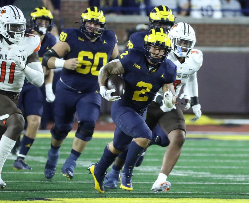 Michigan running back Blake Corum runs for a first down during the first half against Bowling Green on Saturday, Sept. 16 2023, in Ann Arbor.