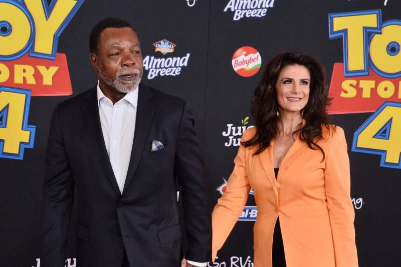 Carl Weathers, seen with Christine Kludjian, voiced Combat Carl in the "Toy Story" series. File Photo by Jim Ruymen/UPI