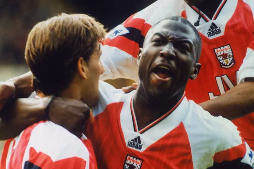 Kevin Campbell celebrates an Arsenal goal.