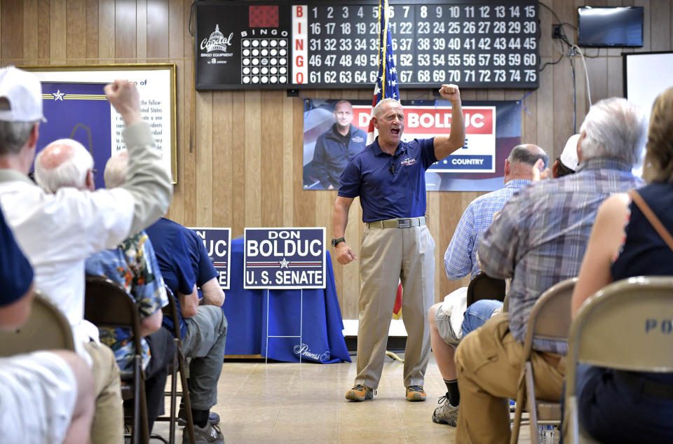 LACONIA, NH - SEPTEMBER 10:-  Republican candidate for Senate, retired United States Army brigadier general Don Bolduc, center, during a campaign rally at an American Legion Hall. Polls show Bolduc, who deneis the legitimacy of the Biden presidency, leading  former acting governor Chuck Morse in The New Hampshire primary, which will take place Tuesday, September 13. (Photo by Josh Reynolds for for The Washington Post via Getty Images)