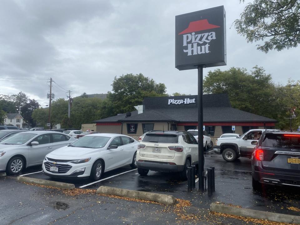 People flocked to Pizza Hut on East Pulteney Street in Corning Thursday for lunch as the restaurant, closed since 2020, reopened under new management.