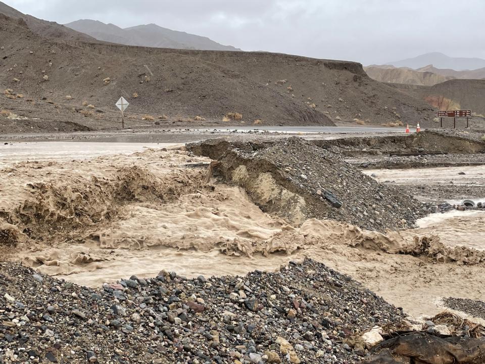 Flash flooding over Badwater Road near the CA-190 junction. (NPS photo)