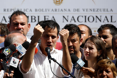 Juan Guaido, President of the Venezuelan National Assembly and lawmaker of the opposition party Popular Will (Voluntad Popular), gestures while he speaks during a gathering in La Guaira, Venezuela January 13, 2019. REUTERS/Carlos Garcia Rawlins