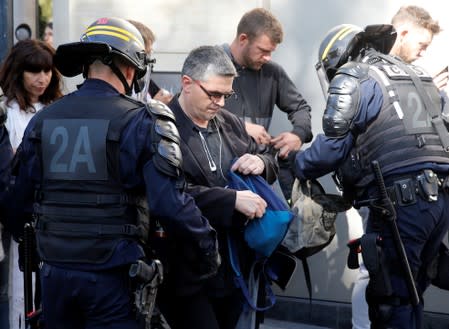 Protesters attend a demonstration on Act 45 (the 45th consecutive national protest on Saturday) of the yellow vests movement in Paris