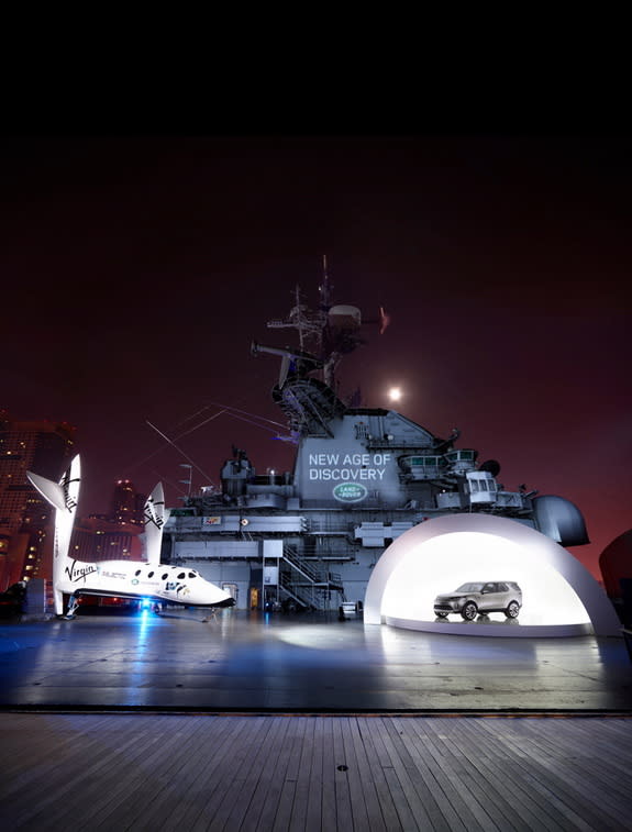 Land Rover’s new Discovery Vision Concept car alongside Virgin Galactic's SpaceShipTwo, the world’s first commercial spaceship, at the Intrepid Sea, Air & Space Museum, Image released April 14, 2014.