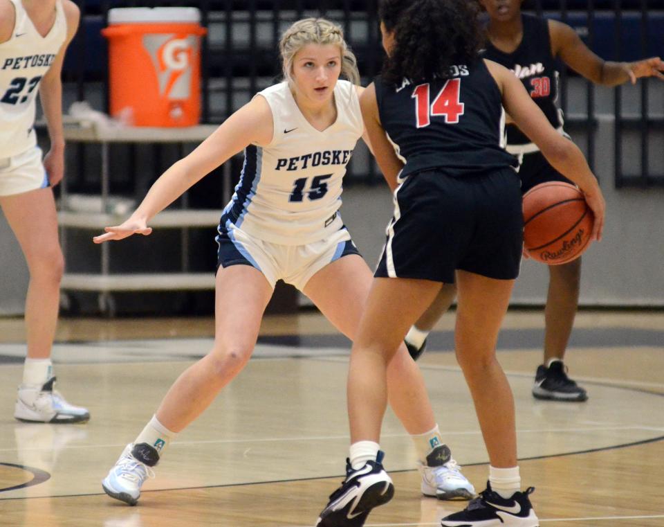 Petoskey's Sadie Corey guards a Lake City player during the first half of Friday's game.