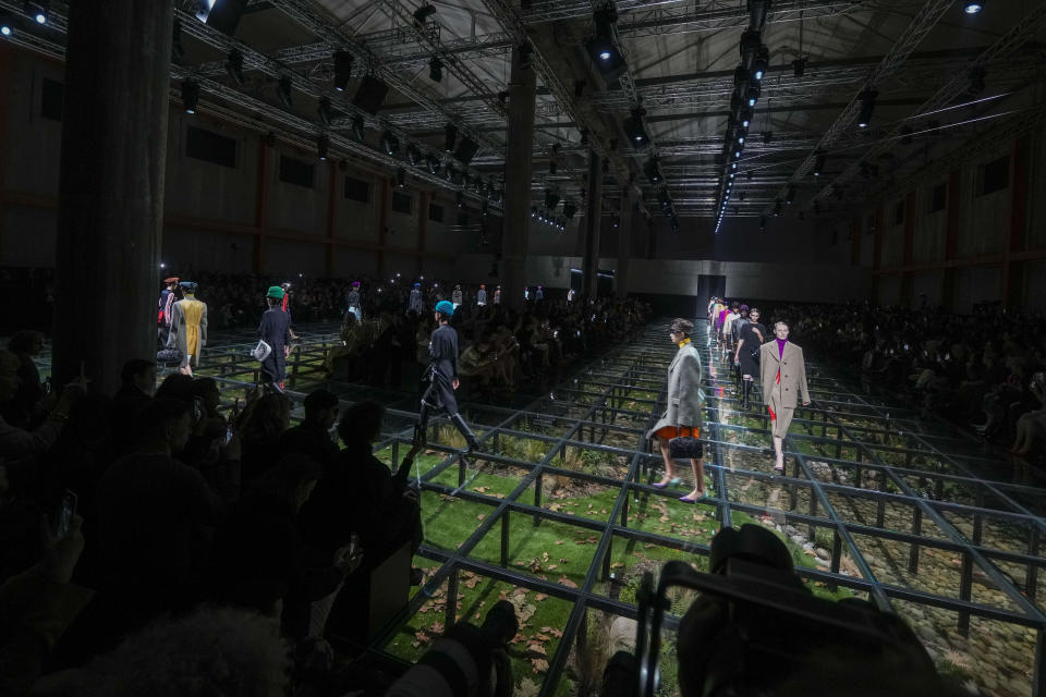 Models wear creations as part of the Prada women's Fall-Winter 2024-25 collection presented in Milan, northern Italy, Thursday, Feb. 22, 2024. (AP Photo/Luca Bruno)