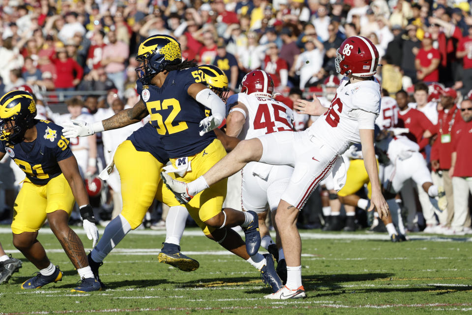 Kechaun Bennett, 52, ran into Alabama punter James Burnip's kicking leg. (Kevork Djansezian/Getty Images)